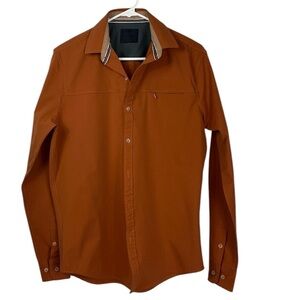 Nomad long sleeve button down hidden pocket shirt Sz S Rust